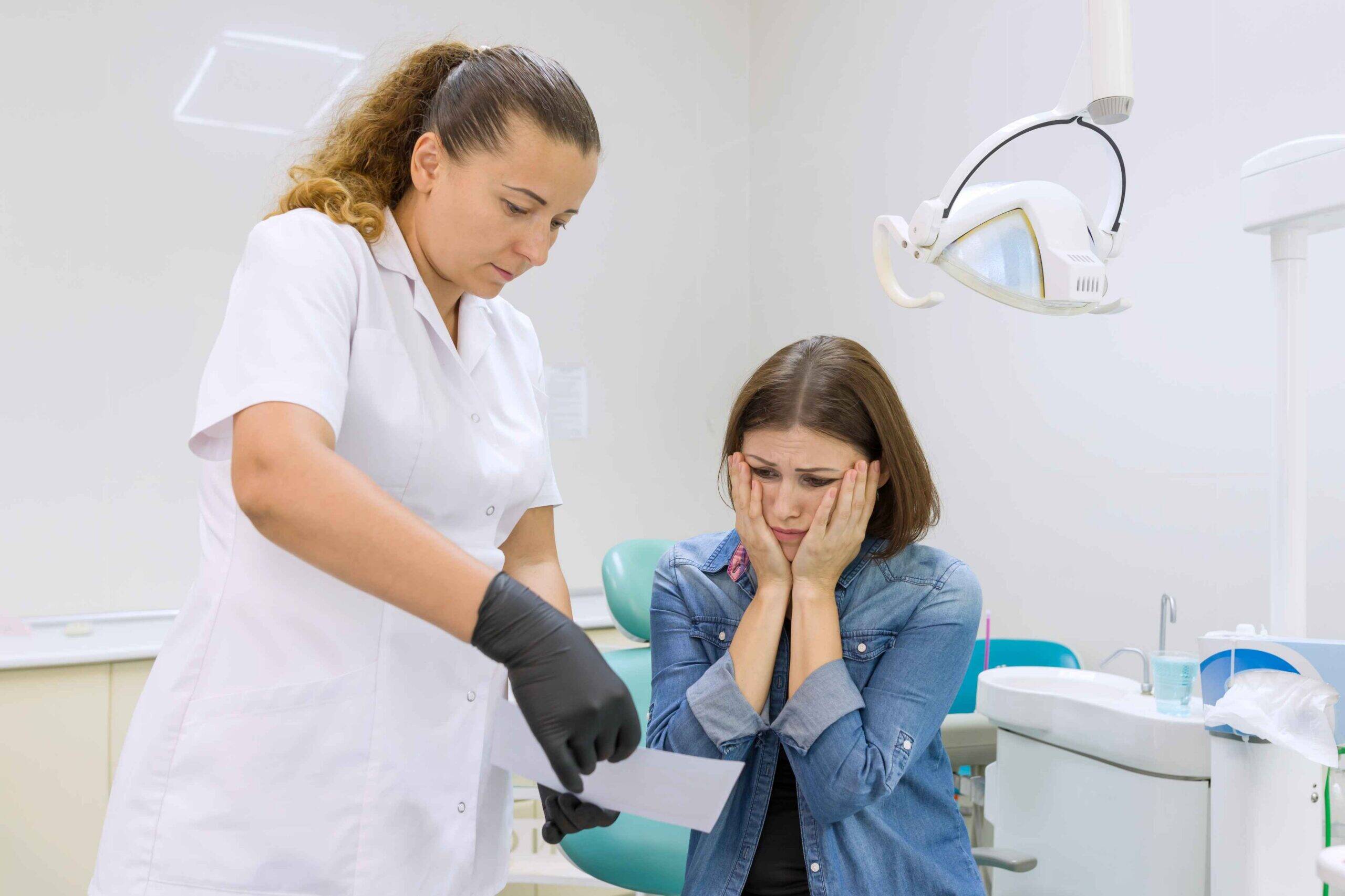 Upset patient discussing dental concerns.